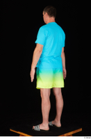  Spencer blue t shirt blue yellow shorts dressed slides standing whole body 0004.jpg